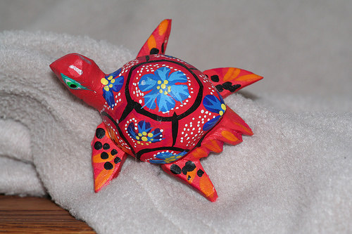brightly colored turtle carving